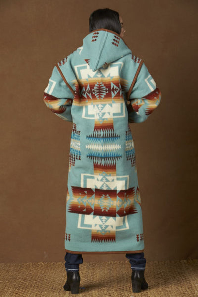 Long wool coat, aqua blue with ivory and earth tone geometric accents in the Chief Joseph pattern by Pendleton.
