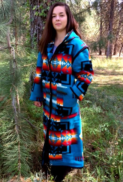 Long wool coat, turquoise, with black, orange and red geometric accents in Chief Joseph pattern by Pendleton.