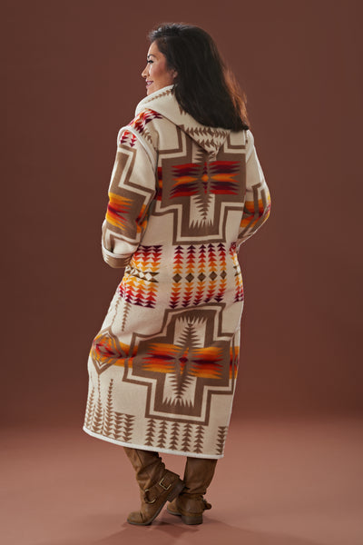 Long wool coat, ivory with tan, yellow, red and orange geometric accents in Harding Ivory by Pendleton.