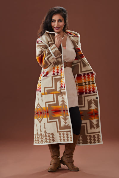 Long wool coat, ivory with tan, yellow, red and orange geometric accents in Harding Ivory by Pendleton.