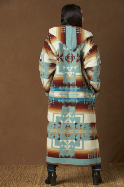 Long wool coat, aqua blue with ivory and earth tone geometric accents in the Chief Joseph pattern by Pendleton.