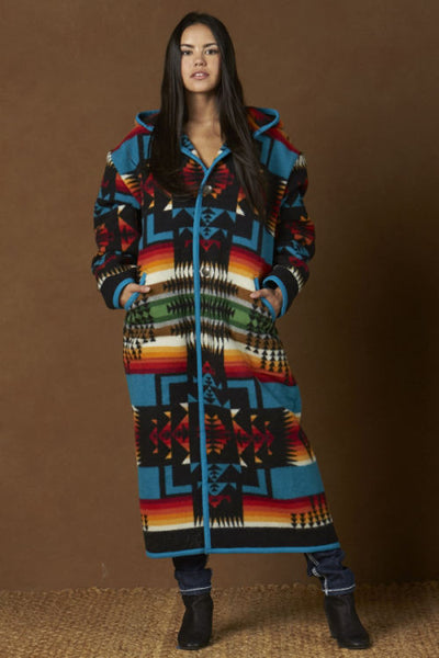 Long wool coat, black with turquoise, red and orange geometric accents in Chief Joseph pattern by Pendleton.