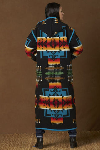 Long wool coat, black with turquoise, red and orange geometric accents in Chief Joseph pattern by Pendleton.